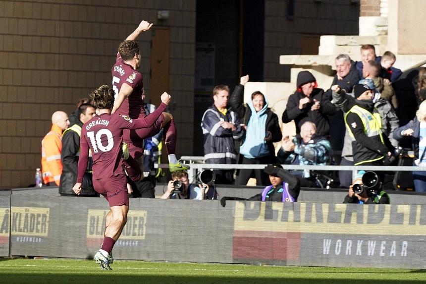 Controversial winner from John Stones helps Manchester City survive Wolverhampton Wanderers scare